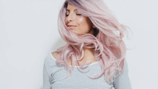 istock Girl with a pink hair 1288076474