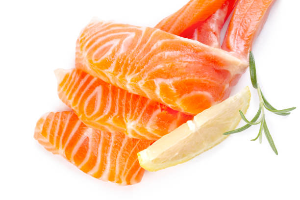istock Fresh salmon sashimi slices and lemon 1288077256