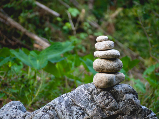 Stacked stones, leaves and nature