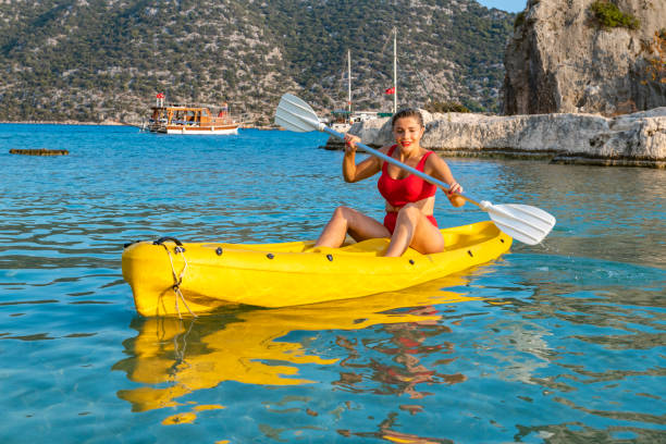 istock Joyful woman in the canoe. 1288083519