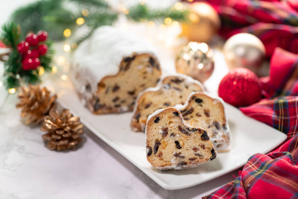 istock Christmas stollen on wooden background. 1288083825