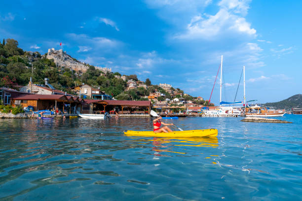 istock Joyful woman in the canoe. 1288083968