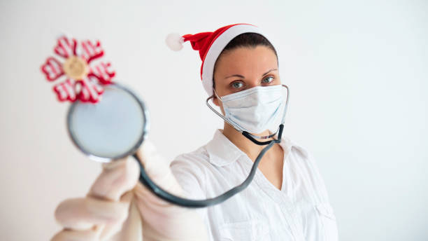 istock A female doctor examines with a stethoscope during the holidays. 1288086640