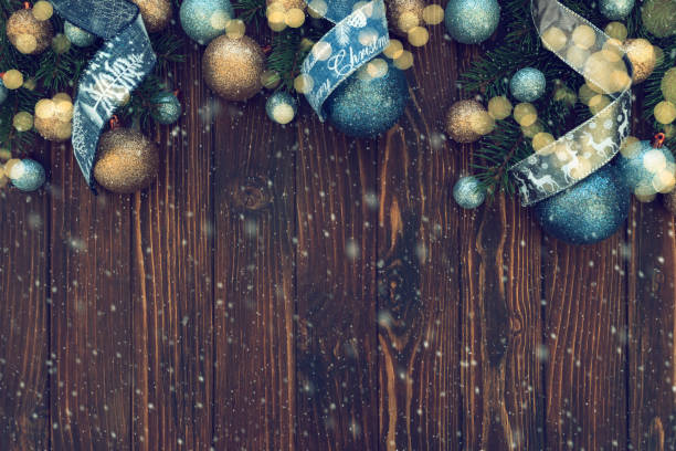 istock Christmas composition. Christmas balls, blue and silver decorations on blue wooden background. Flat lay. Top view. Copy space 1288087718