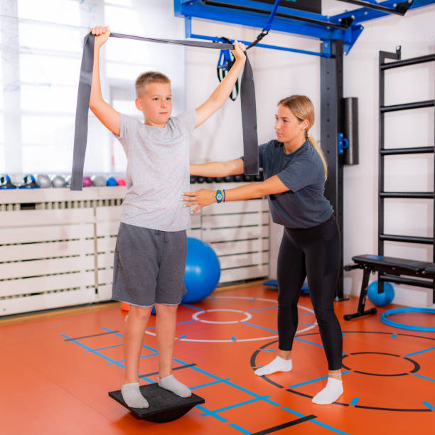 istock Balance exercise for children with balancing disks 1288089424