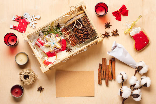 istock care package, seasonal gift box with coffee, gingerbread and cinnamon Personalized eco friendly basket for family, friends for thankgiving, christmas, mothers, fathers day Flat lay 1288090046