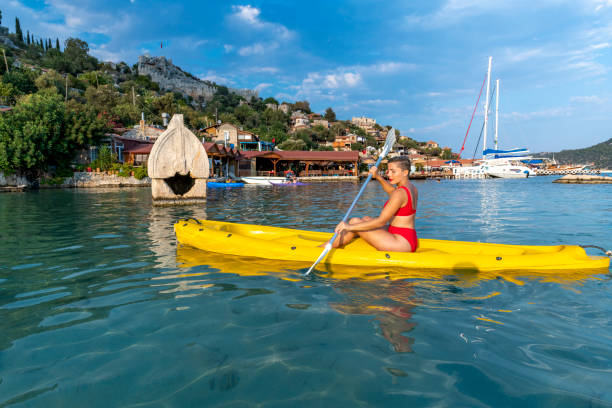 istock Joyful woman in the canoe. 1288090208