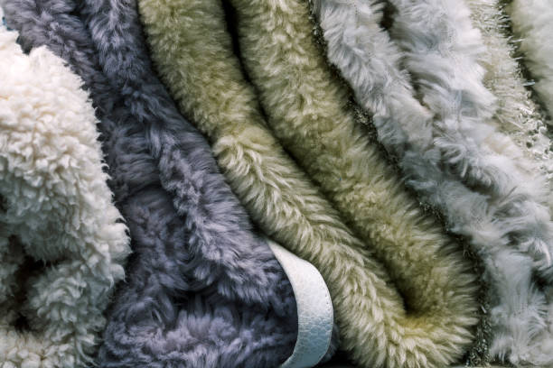 istock Wool fabric. A soft and warm blanket. Material for the production of clothing. Cloth samples close up. Textile background. 1288090219