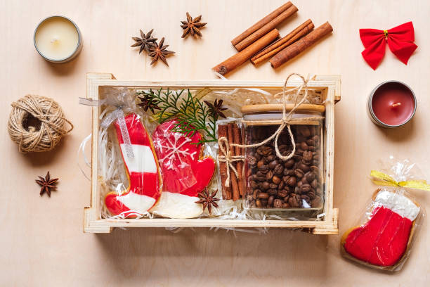 istock care package, seasonal gift box with coffee, gingerbread and cinnamon Personalized eco friendly basket for family, friends for thankgiving, christmas, mothers, fathers day Flat lay 1288090252