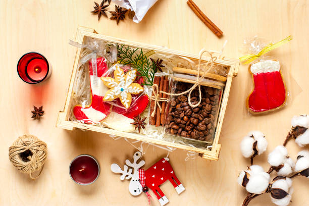 istock care package, seasonal gift box with coffee, gingerbread and cinnamon Personalized eco friendly basket for family, friends for thankgiving, christmas, mothers, fathers day Flat lay 1288091105