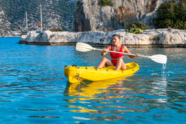 istock Joyful woman in the canoe. 1288091210