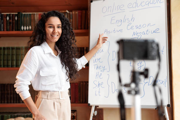 istock Teacher recording video blog for her internet channel 1288091326