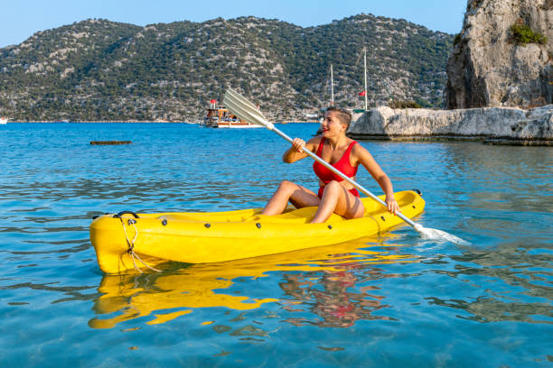 istock Joyful woman in the canoe. 1288091395