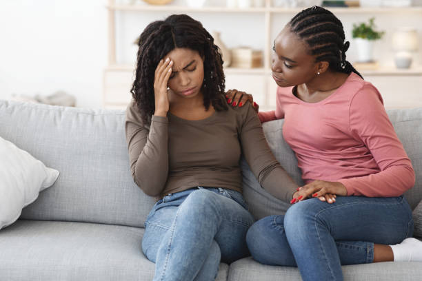 istock African american lady comforting her sick girlfriend 1288092385