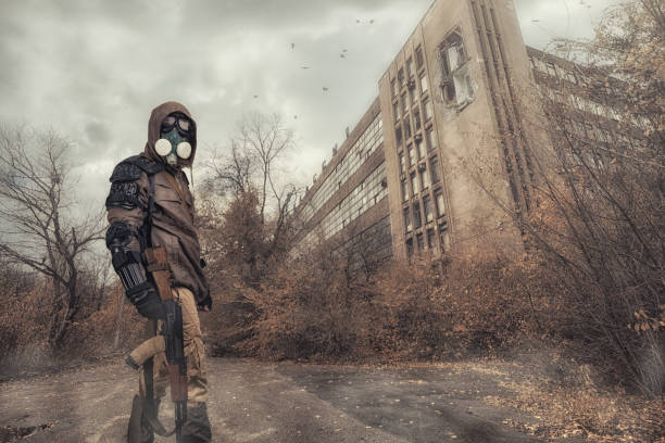 istock Cyber punk, postapocalyptic world, man in goggles, gas mask 1288092798