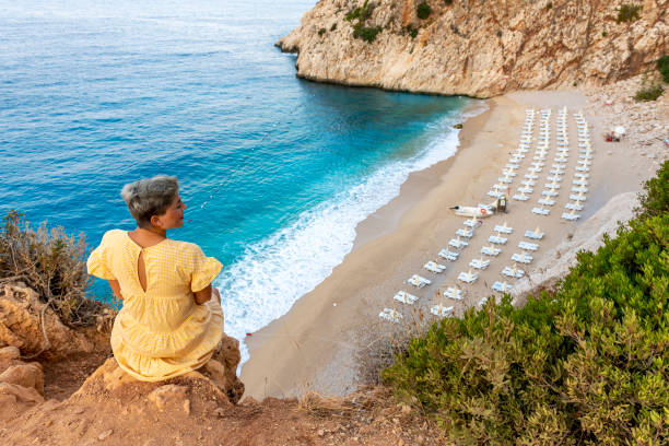 istock Young woman at the beach. 1288094073