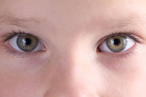 istock Close-up baby eyes and eyebrows look straight. 1288094097