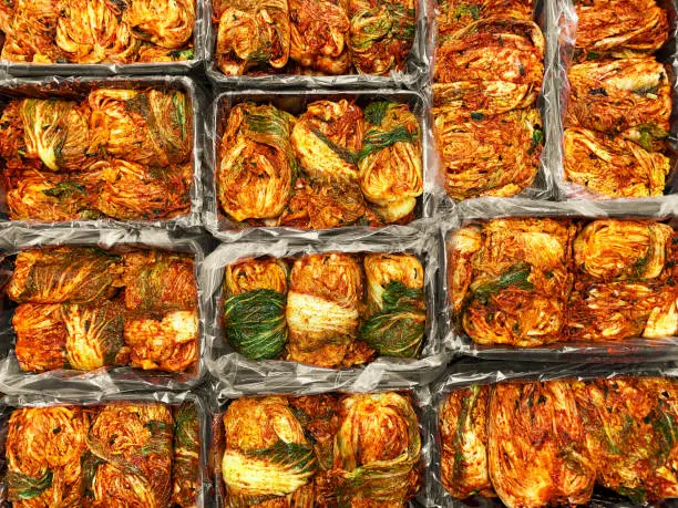 The most famous Korean traditional food Kimchi(napa cabbage) stored in Kimchi container. Make a Kimchi concept. Top view.