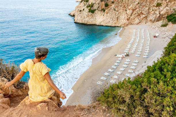 istock Young woman at the beach. 1288095828