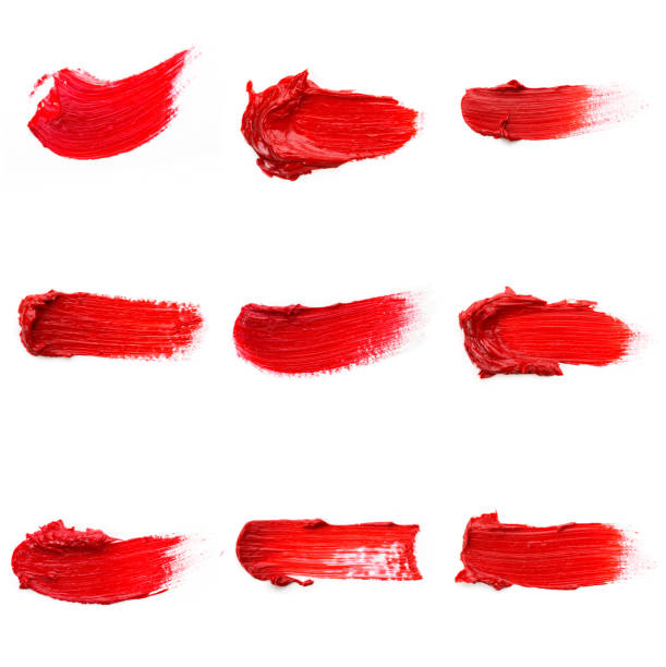 istock Red colored brush stroke paiting over isolated background, canvas watercolor texture, red lipstick smudge 1288097554