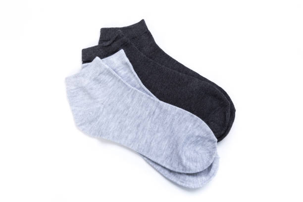 istock two pairs of cheerful colored short socks on a white background, top view 1288097701