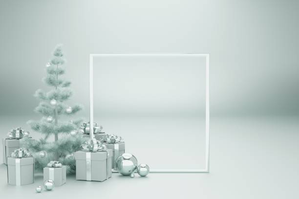 istock minimalistic blue silver colors background panoramic view with gifts, copy space, copy space,gifts, Christmas tree and frame, placed on side the frame, christmas gift card 1288101994