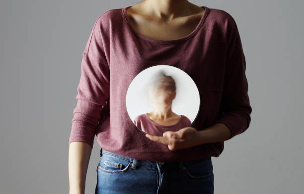 istock Identitiy - who am I? Woman and mirror 1288102955