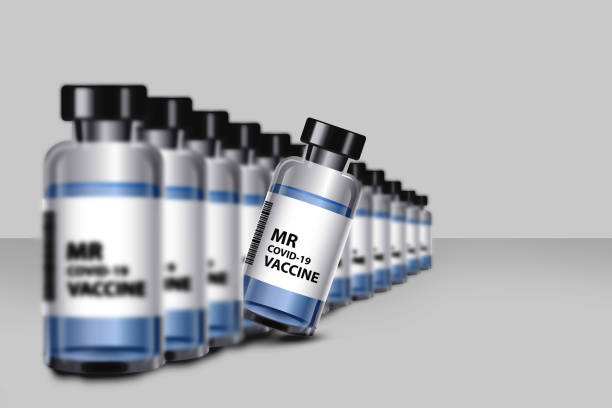 istock Corona Virus Vaccine bottles on banner with copy space 1288104847