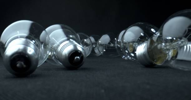 istock Screw thread contact of light bulbs in the foreground. 1288106464