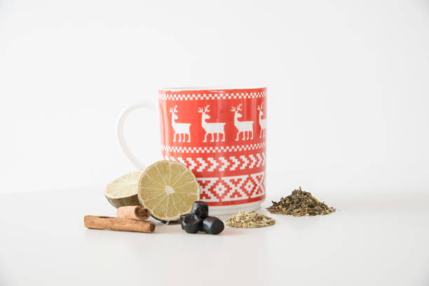 christmas tea cup with spices stock photo