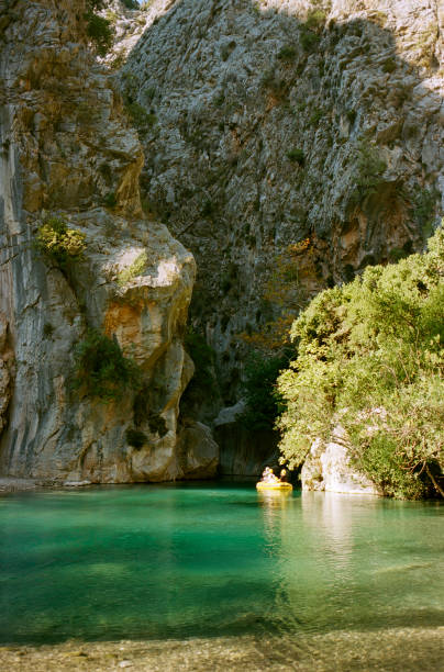 istock Boat on river in canyon 1288108616