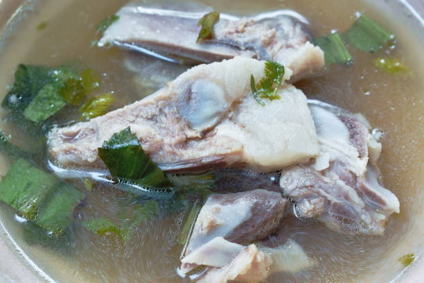 istock boiled  pork bone in clear soup in bowl 1288109905