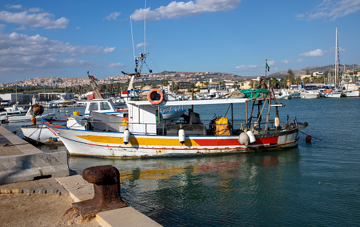 Fishing boats in typical Sicilian port, Italy