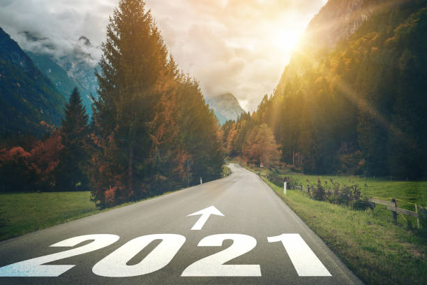 istock 2021 New Year road trip travel and future vision concept . 1288117329