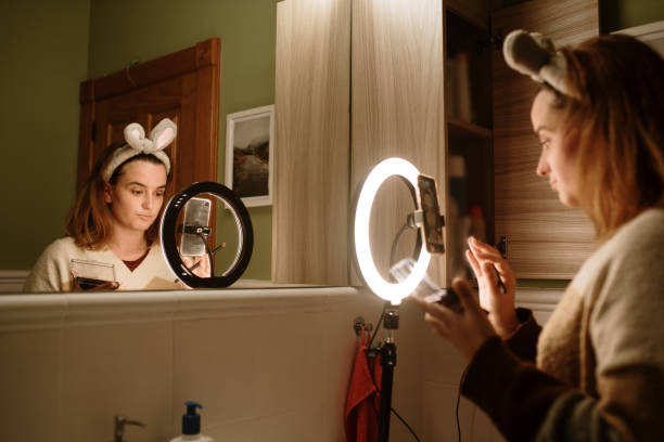 istock Young vlogger recording a video about make-up 1288117467