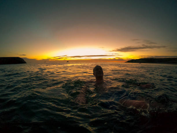 istock Early Morning Swim During Sunrise 1288118506