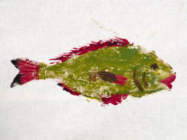 istock finished first print of green colored Orata fish 1288122707