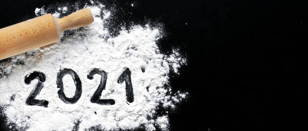 Baking flour and number 2021 on black board