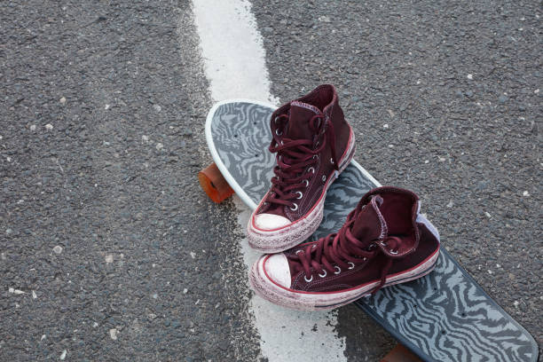 istock Canvas shoes on skateboard 1288124016