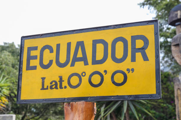 People, signage and experiments at the Equator Line in Quito Ecuador Quito, Ecuador - March 23, 2020: People, signage and experiments at the Equator Line in Quito Ecuador equator line stock pictures, royalty-free photos & images