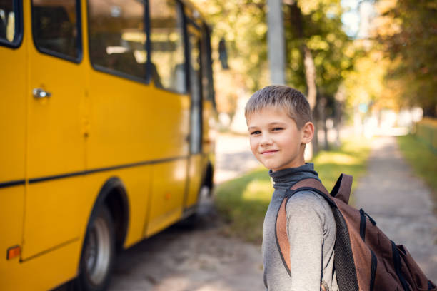 istock Small boy going home after school after the day of studying. 1288127128