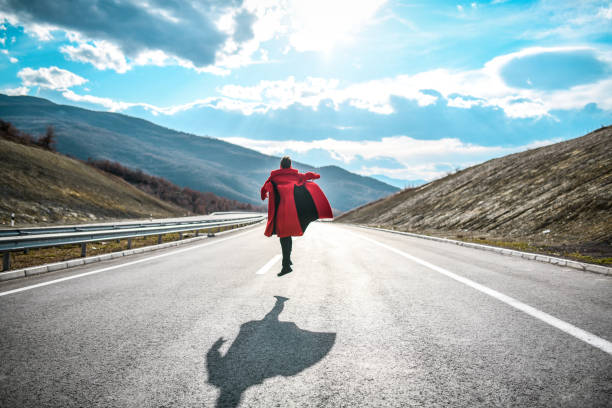 Male Magician Levitating Above Motorway