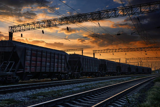 istock railway and cars in a beautiful sunset, dramatic sky and sunlight 1288128812
