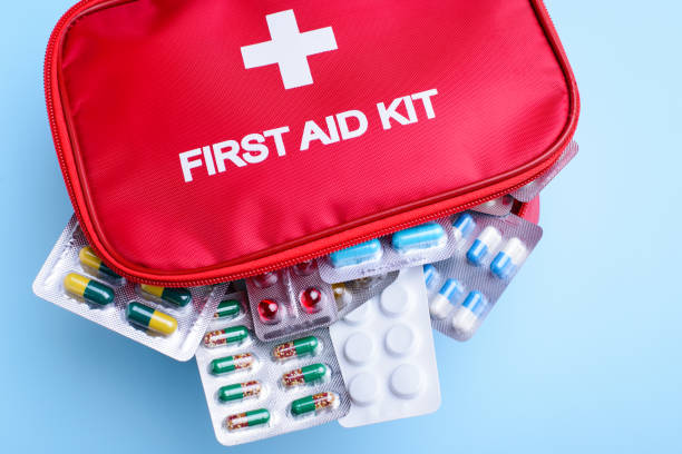 istock First aid kit full of different medicine on light blue background 1288131602