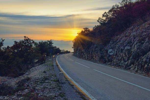 istock Mountain road at autumn sunset. Montenegro 1288131982