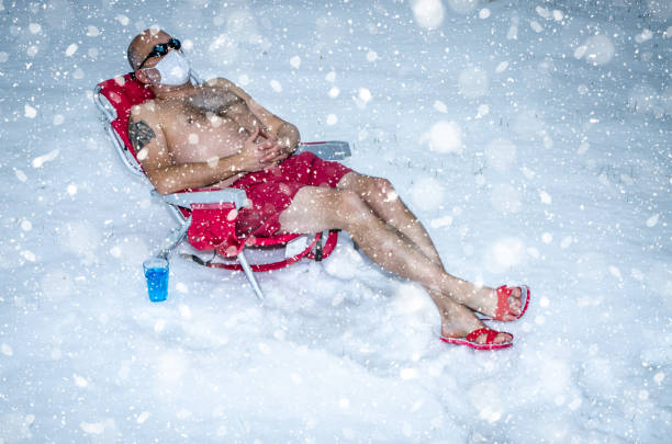 istock Man relaxing in swimming suit during winter 1288138389