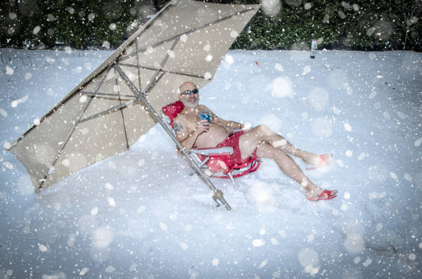 istock Man relaxing in swimming suit during winter 1288138428