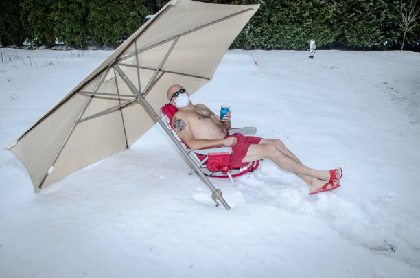 istock Man relaxing in swimming suit during winter 1288138971
