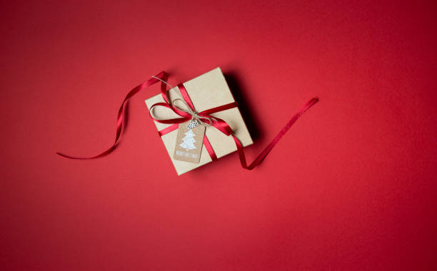 istock christmas gift box on the red background 1288138998