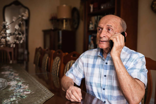 istock Senior man taking to phone 1288139461